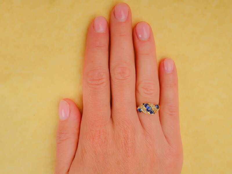 
                      
                        Sapphire Swirl - Edwardian Ring Dated 1903
                      
                    