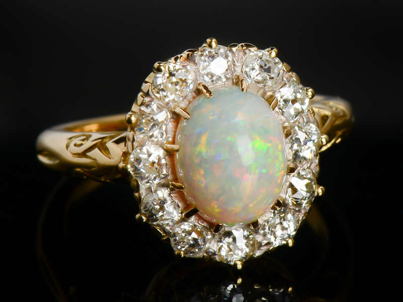 
                      
                        Light Show - Antique Opal Diamond Halo Ring
                      
                    
