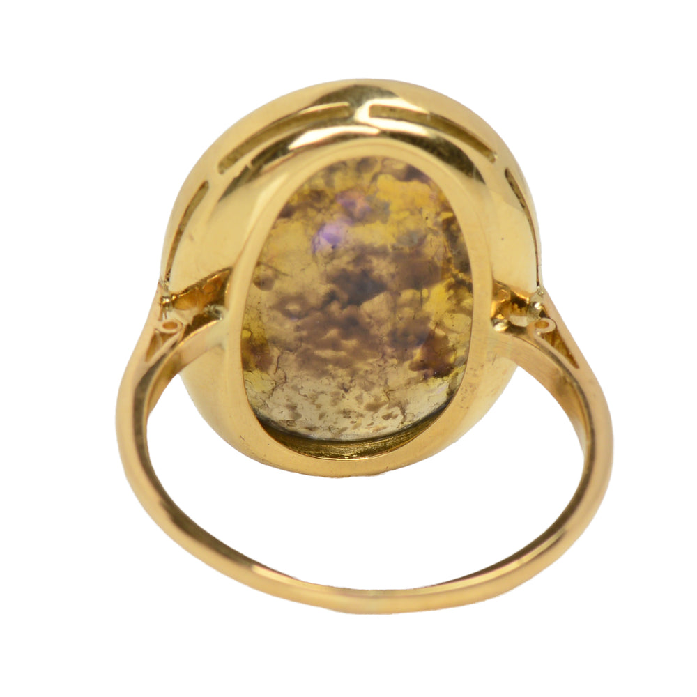 
                      
                        Antique Chromatic Black Opal Gold Ring
                      
                    