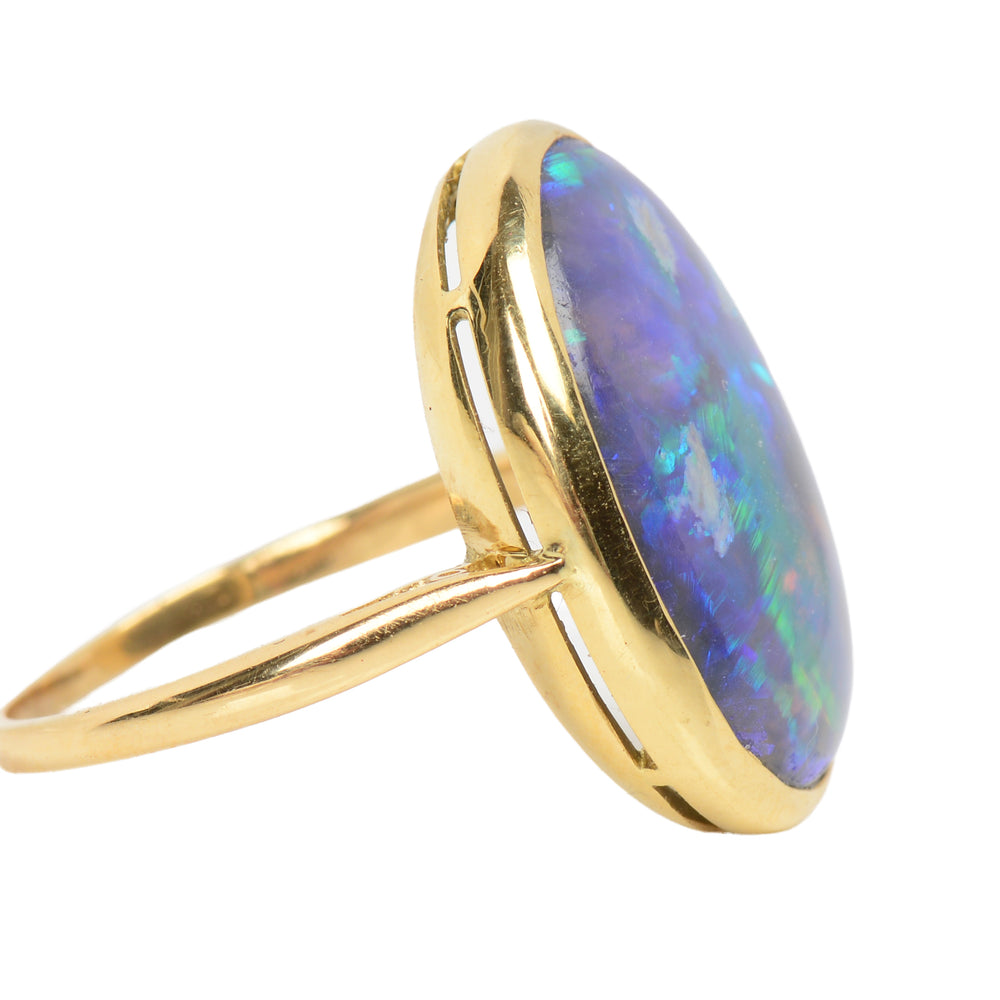 
                      
                        Antique Chromatic Black Opal Gold Ring
                      
                    