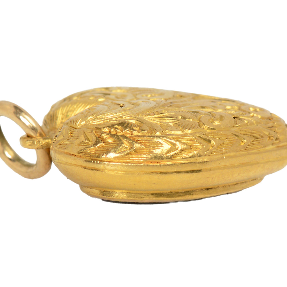 
                      
                        Antique Engraved Puffy Heart Locket Pendant
                      
                    