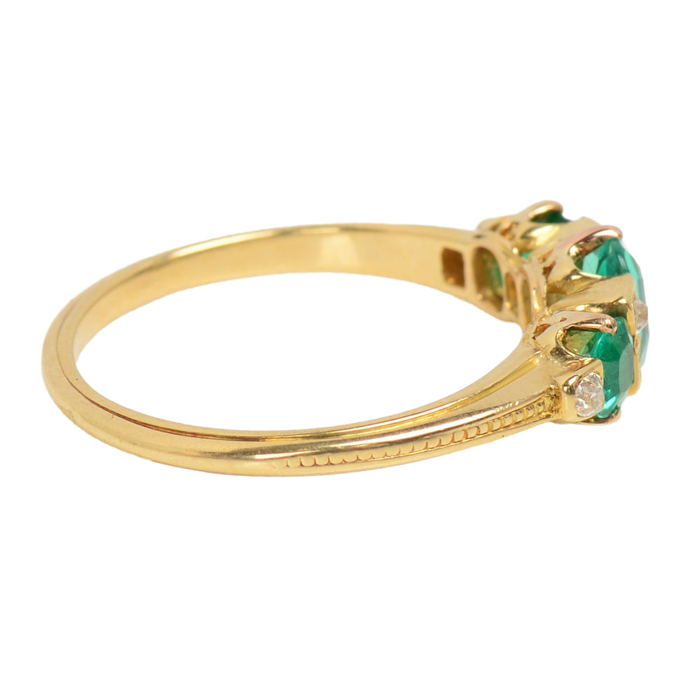 
                      
                        Edwardian Antique Three Emerald Diamond Ring
                      
                    