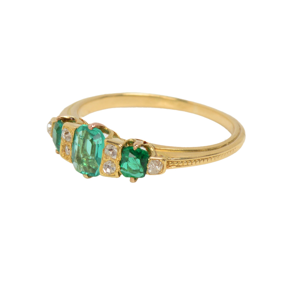 
                      
                        Edwardian Antique Three Emerald Diamond Ring
                      
                    