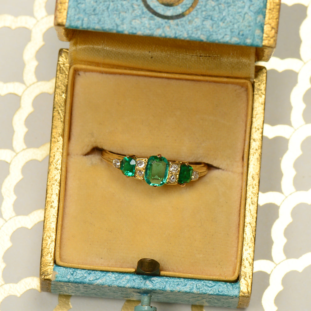 
                      
                        Edwardian Antique Three Emerald Diamond Ring
                      
                    
