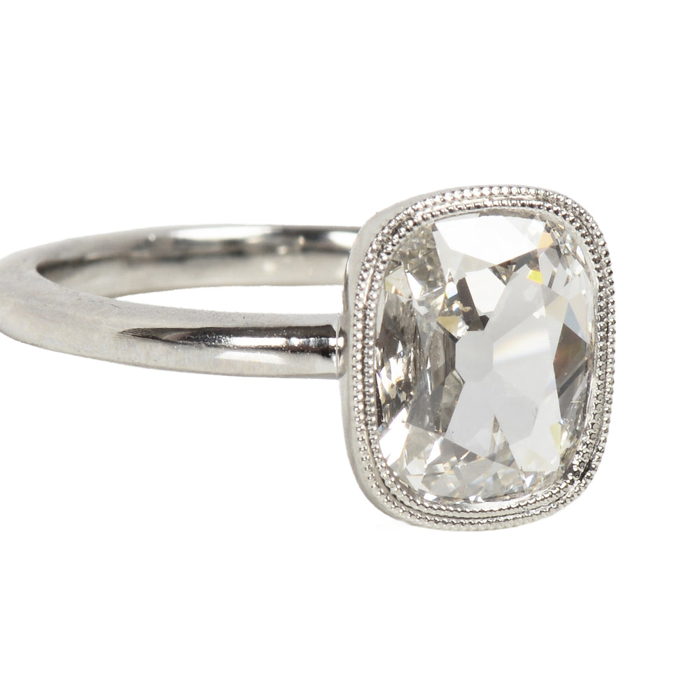 
                      
                        Antique Cushion Cut Diamond Platinum Ring
                      
                    