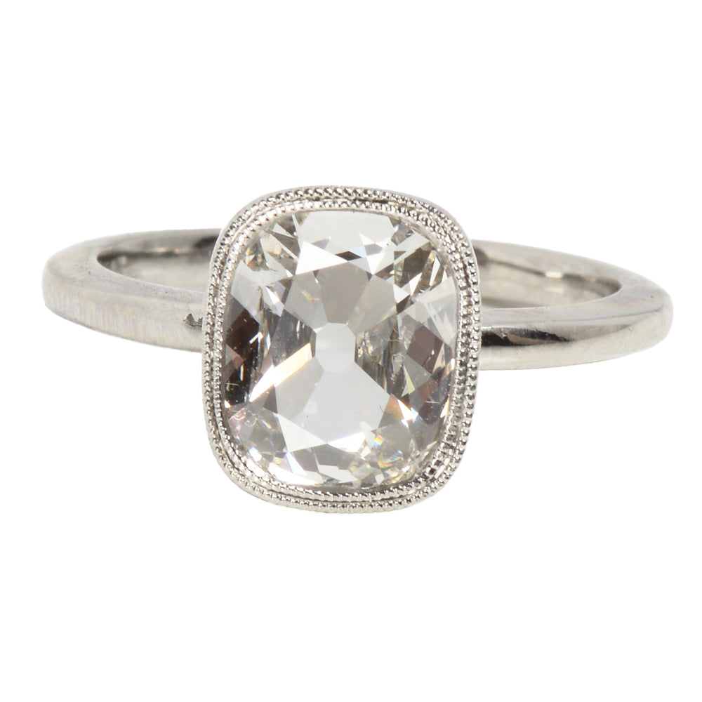 
                      
                        Antique Cushion Cut Diamond Platinum Ring
                      
                    