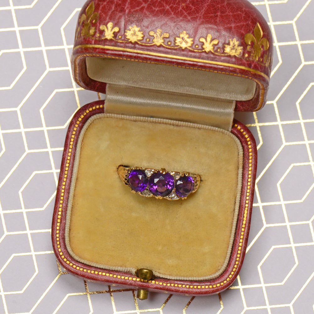 
                      
                        Depth of Feeling - Three Amethyst Antique Ring
                      
                    