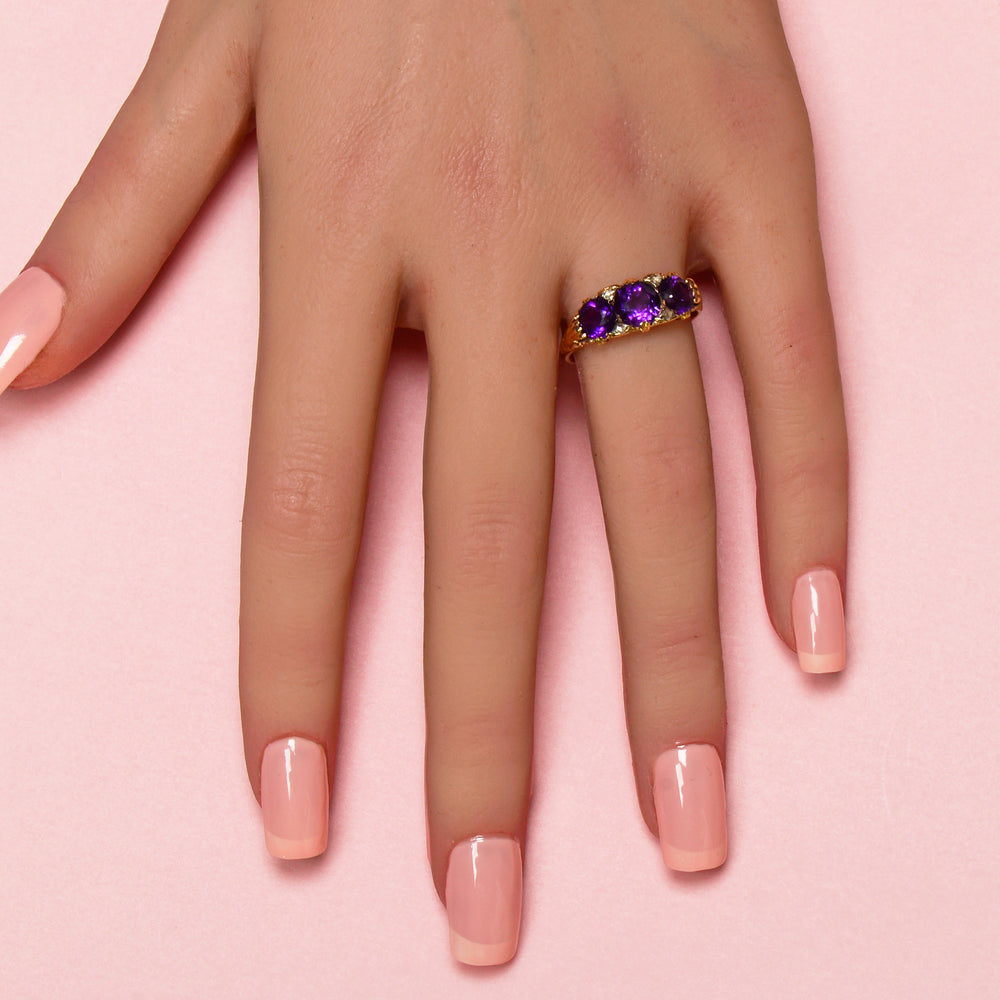 
                      
                        Depth of Feeling - Three Amethyst Antique Ring
                      
                    