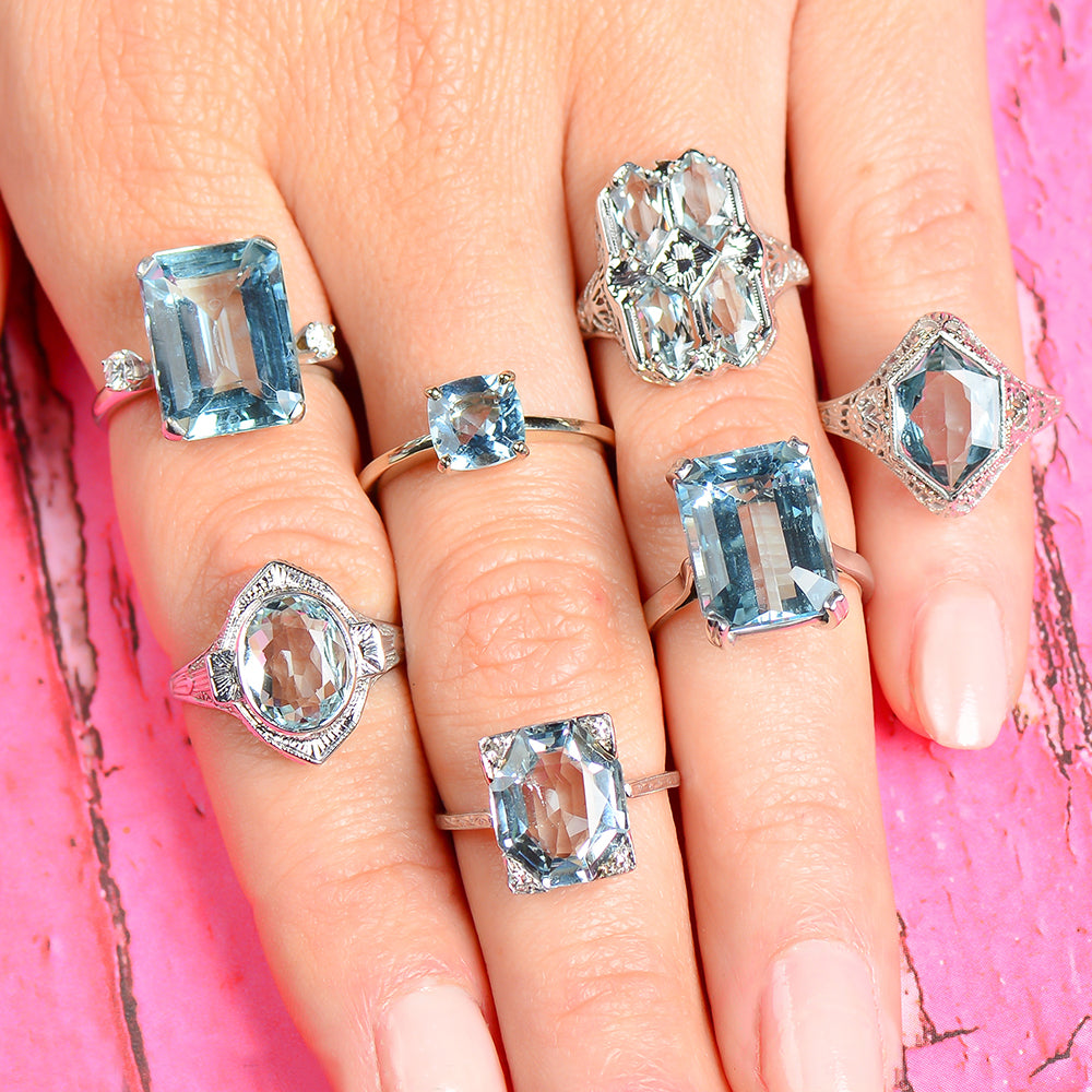 Aquamarine rings on hand