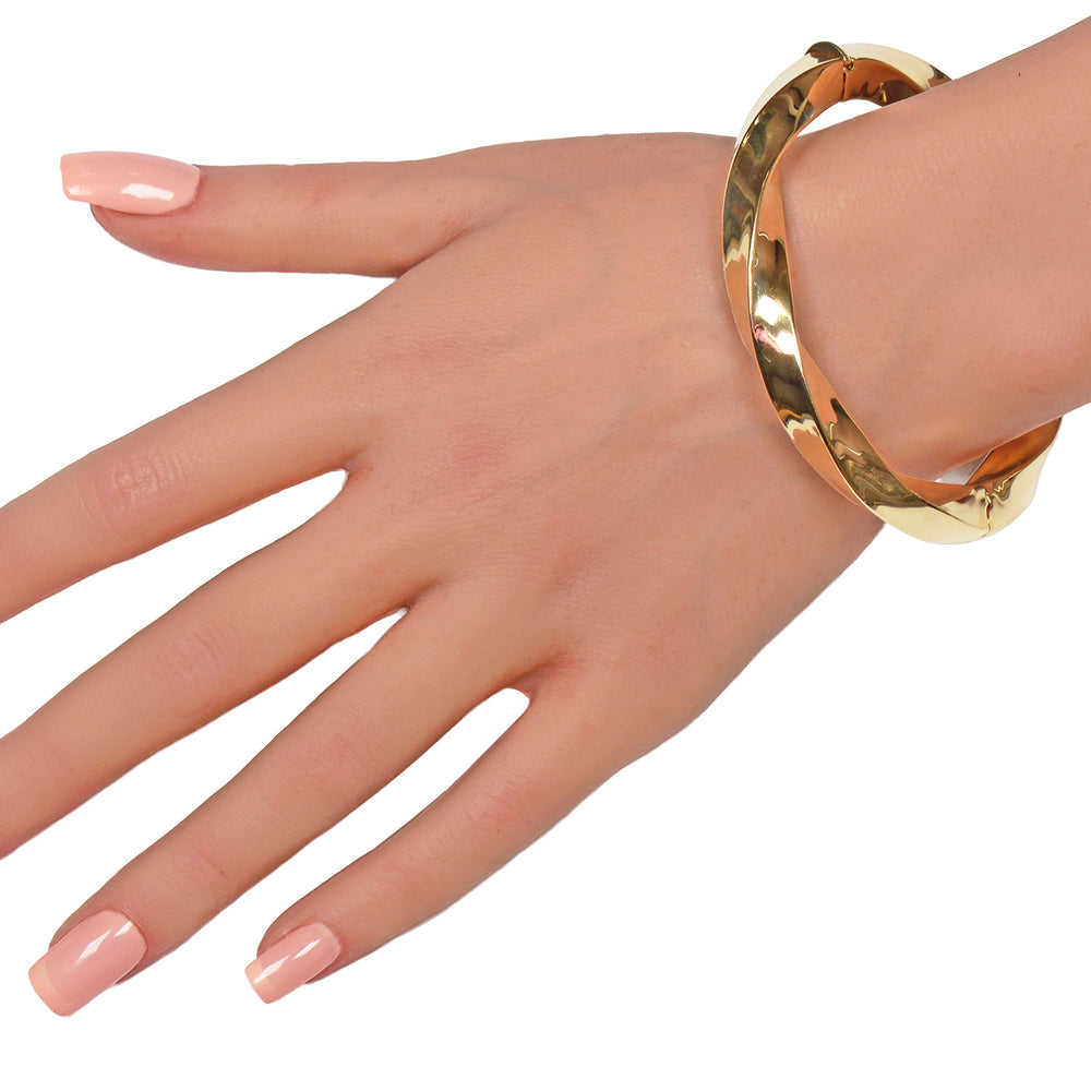 
                      
                        Italian Vintage 14k Gold Bangle Bracelet with a Twist
                      
                    