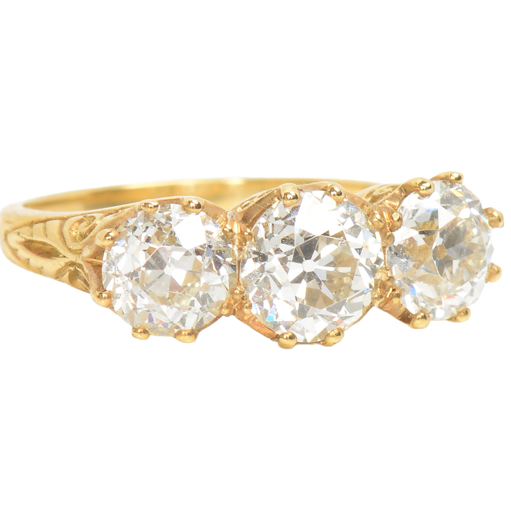 Three Old European Cut Diamond Trilogy Ring of 3.16 Carats