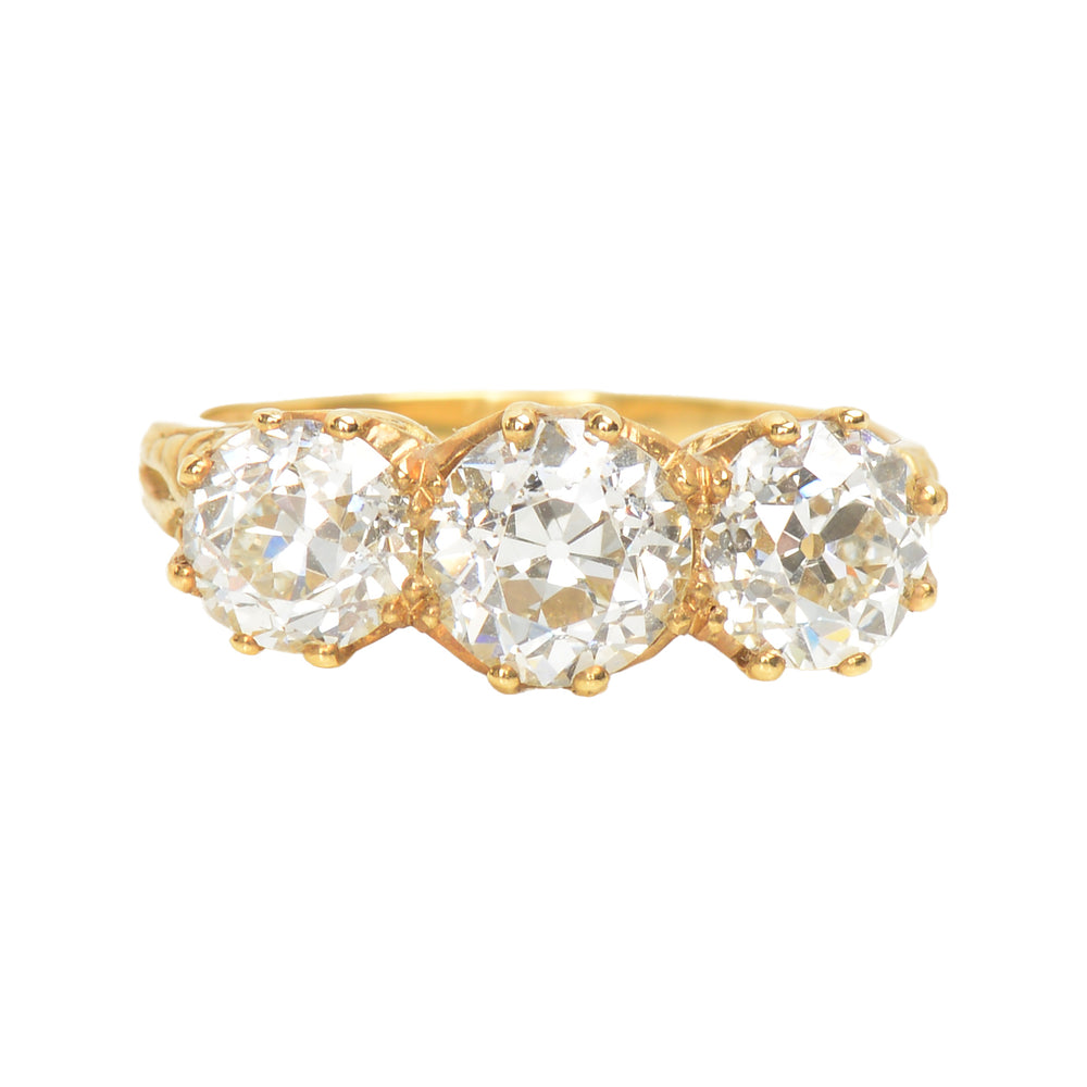 Three Old European Cut Diamond Trilogy Ring of 3.16 Carats