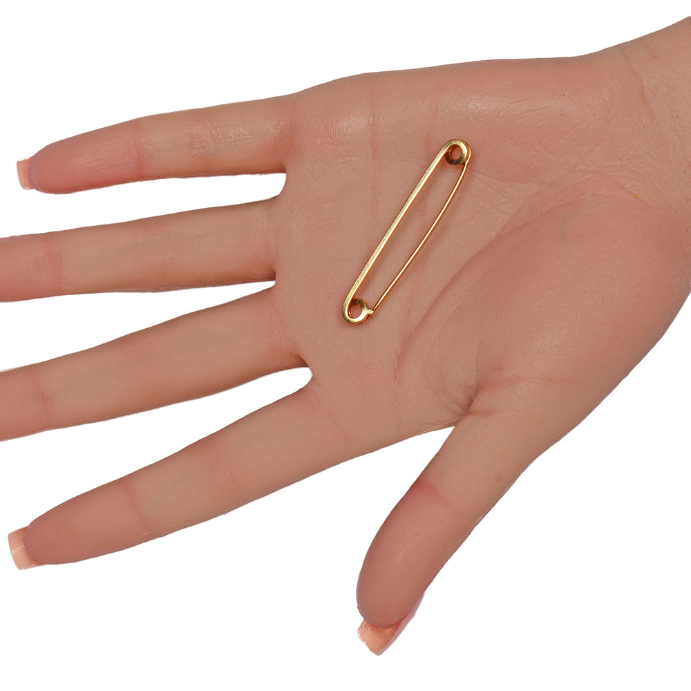 
                      
                        Tiffany & Co. Gold Safety Pin Brooch
                      
                    