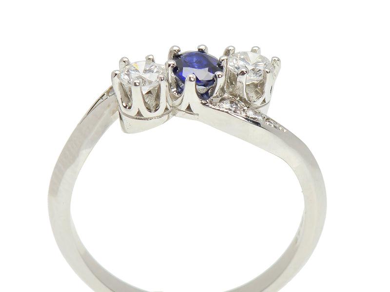 
                      
                        Inspired Crossover Sapphire Diamond Ring
                      
                    