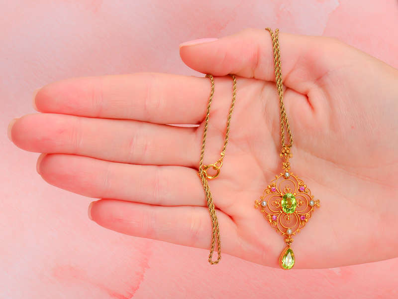 
                      
                        Edwardian Peridot Ruby Pendant
                      
                    