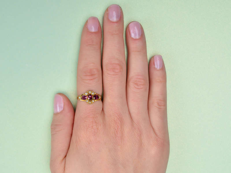 
                      
                        Victorian Garnet Natural Pearl Ring of 1872
                      
                    