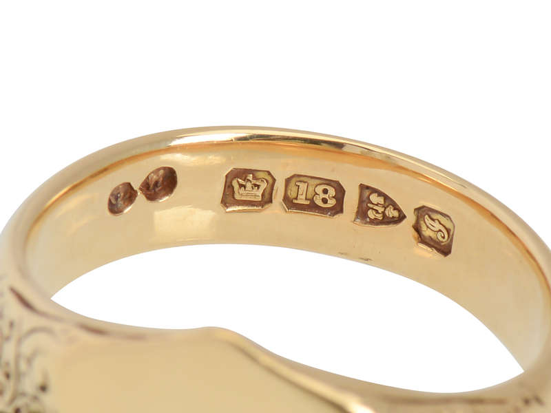 
                      
                        Distinction - Antique 18k Gold Signet Ring of 1907
                      
                    