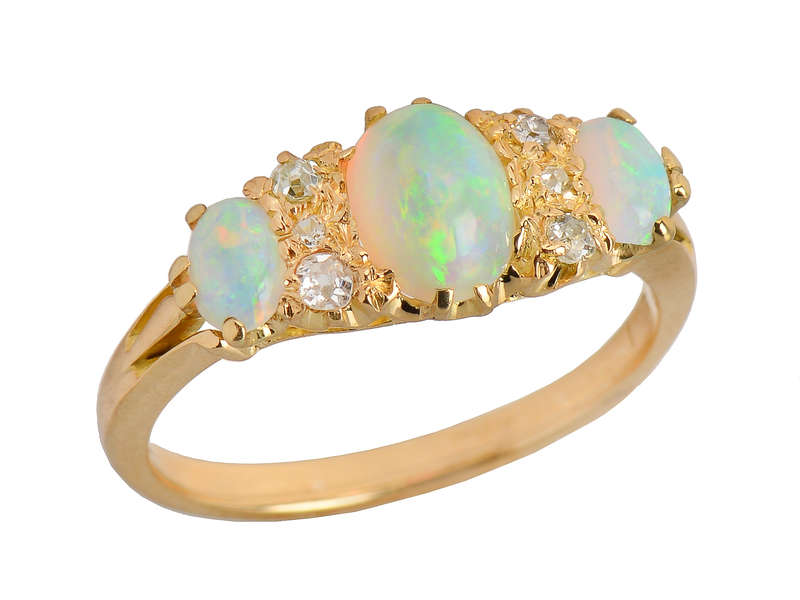 
                      
                        Antique Three Opal Diamond Ring in 18k
                      
                    
