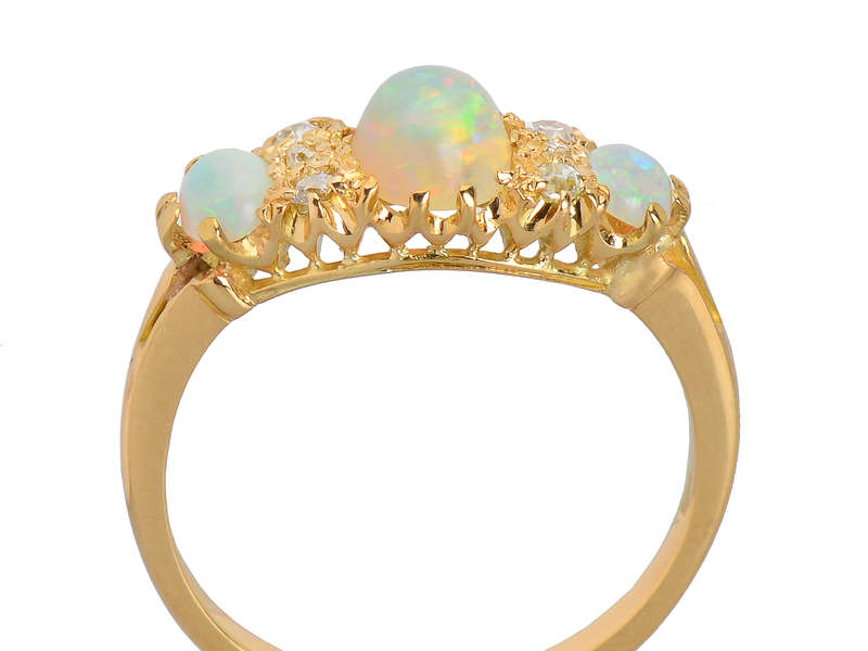
                      
                        Antique Three Opal Diamond Ring in 18k
                      
                    