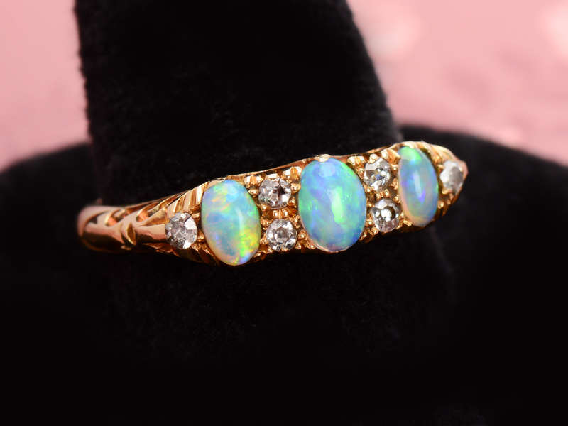 
                      
                        Opal Diamond Trilogy Ring from the Year 1915
                      
                    