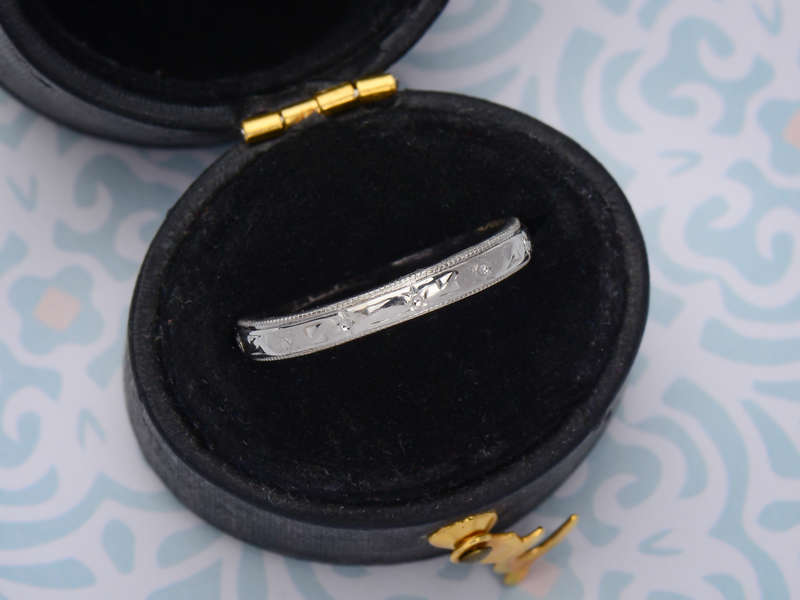 
                      
                        Patterned Platinum Wedding Ring from 1950
                      
                    