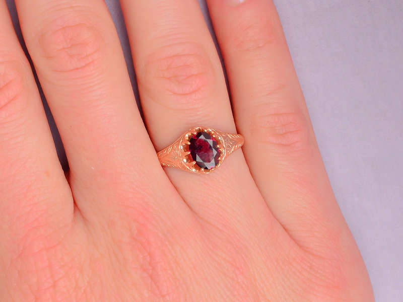 
                      
                        Antique Garnet Rose Gold Ring of 1909
                      
                    
