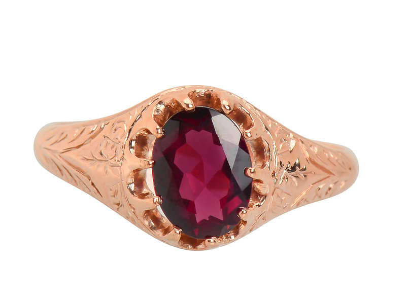 
                      
                        Antique Garnet Rose Gold Ring of 1909
                      
                    