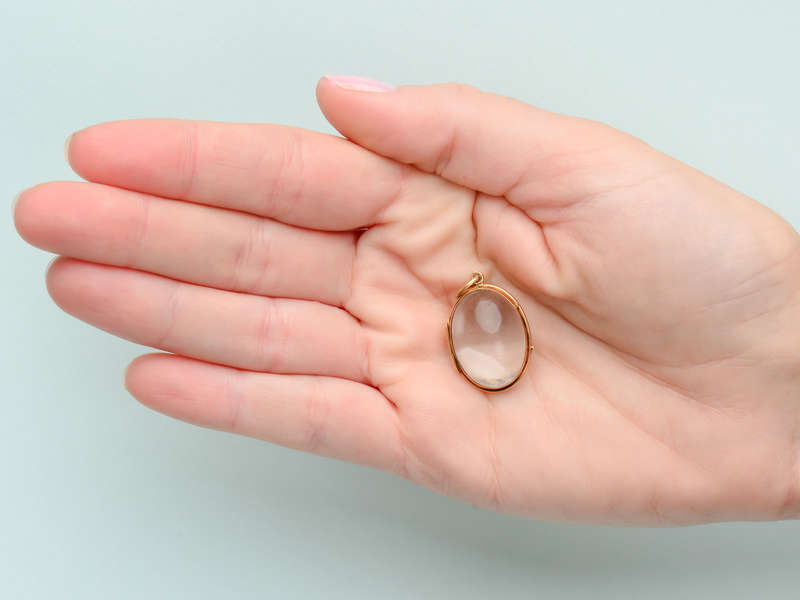 
                      
                        Crystal Clear - Quartz Oval Locket in Gold
                      
                    