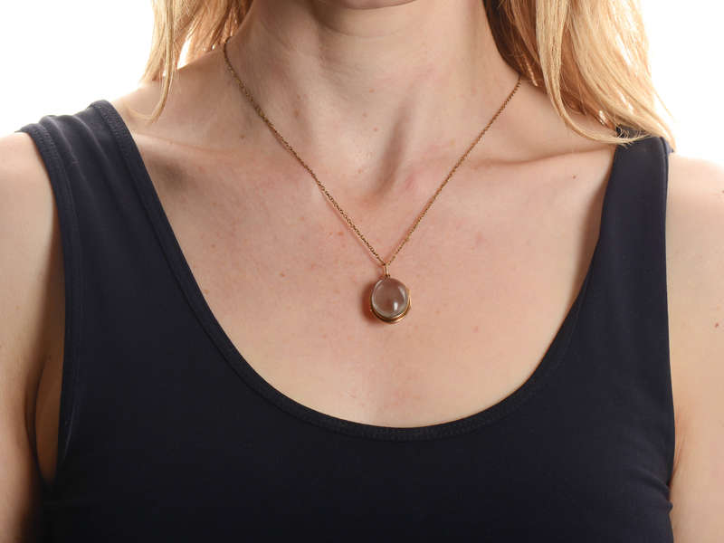 
                      
                        Crystal Clear - Quartz Oval Locket in Gold
                      
                    